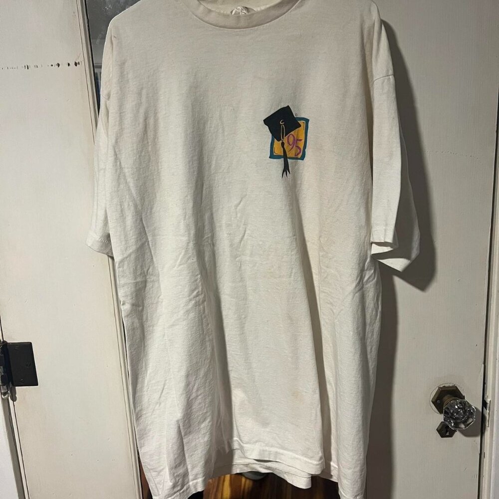 1990s white Hanes T-shirt with a unique graphic on the front #90s
